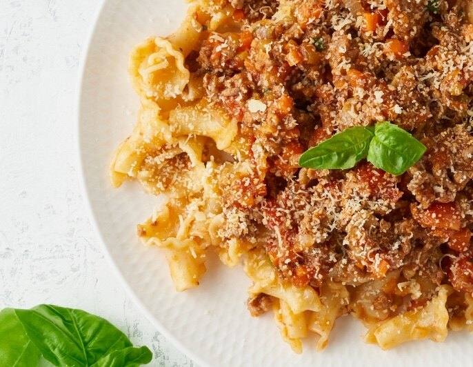 Pasta with Bolognese sauce, Parmesan and basil