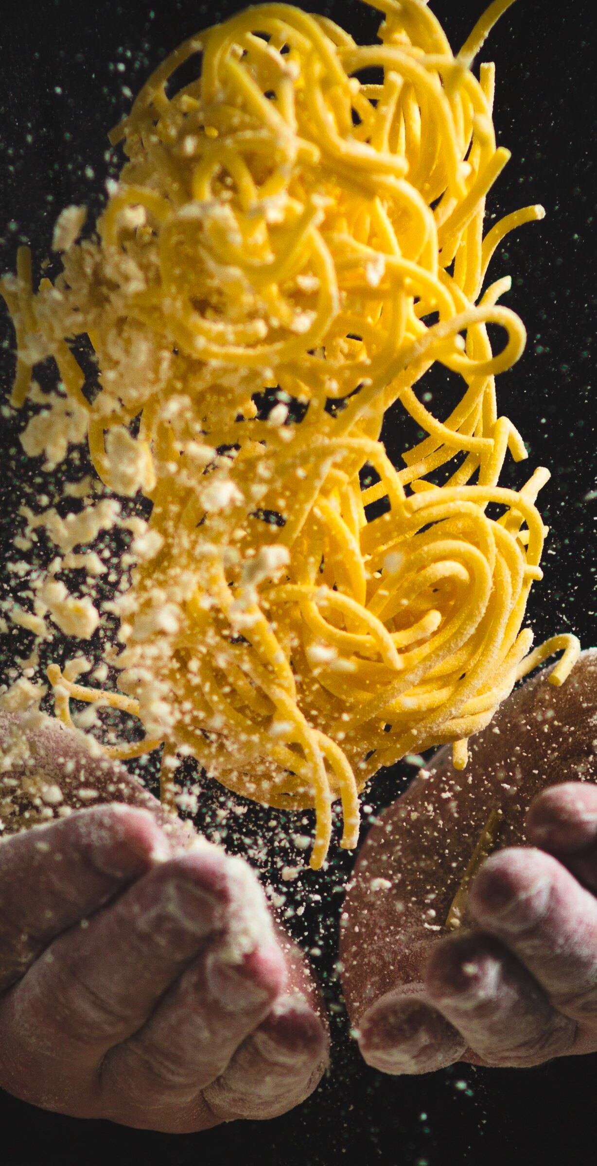 Fresh pasta tossed in a cloud of flour